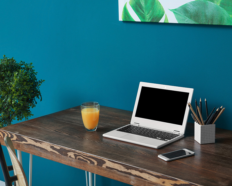 Laptop on a table for online therapy in New York