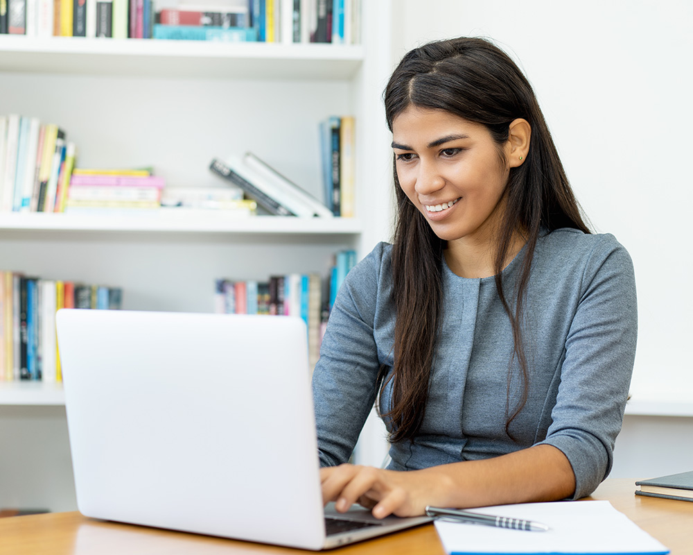 South Asian woman having online therapy in New York